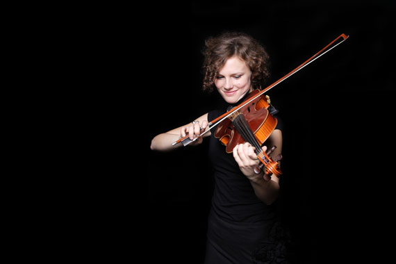 young woman playing a violin